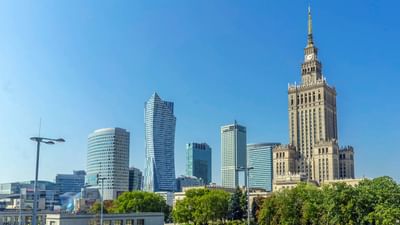 Skyline with modern skyscrapers under blue sky near Polonia Palace Hotel
